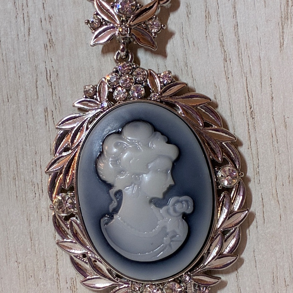 Elegant Blue & White Cameo in a Silver Tone Setting with Decorative Rhinestones